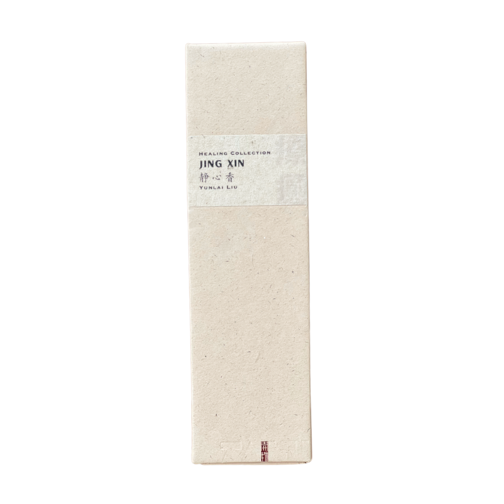 Sustainable Jing Xin Incense box in champagne hue - recycled paper wrap with debossed Kaiwu emblem & artisan Yunlai signature on handmade yellow textured label, embodying mindful luxury.