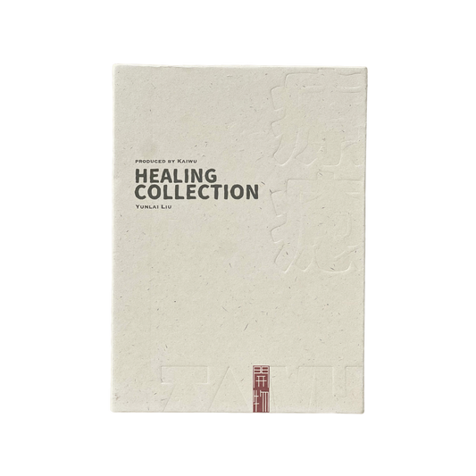 Kaiwu Studio Luxury champagne-colored eco-paper packaging for Healing Collection Incense, featuring a debossed logo and collection name with master Artisan Yunlai Liu's name in elegant calligraphy. Sustainable minimalist design for conscious connoisseurs.