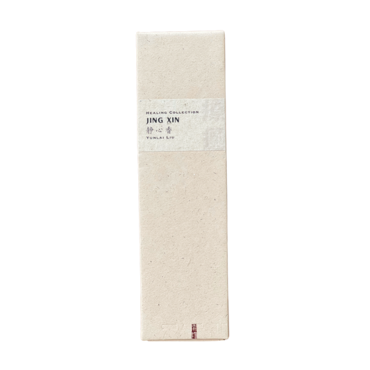Sustainable Jing Xin Incense box in champagne hue - recycled paper wrap with debossed Kaiwu emblem & artisan Yunlai signature on handmade yellow textured label, embodying mindful luxury.