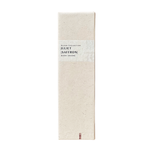 Sustainable Juliet Saffron Incense box in champagne hue - recycled paper wrap with debossed Kaiwu emblem & artisan Bizhi name on handmade yellow textured label, embodying mindful luxury.