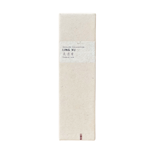 Ancient Craft Spiritual Incense. Sustainable Ling Xu Incense box in champagne hue - recycled paper wrap with debossed Kaiwu emblem & artisan Yunlai signature on handmade yellow textured label, embodying mindful luxury.