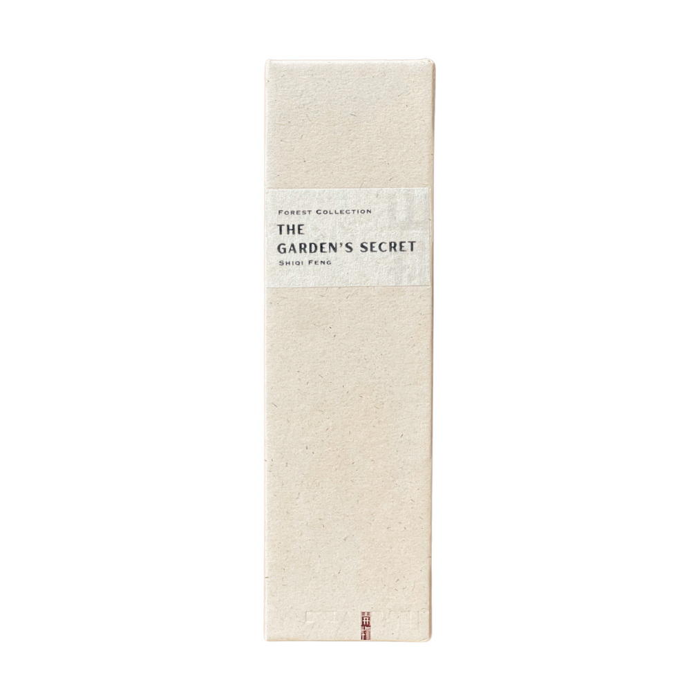Sustainable The Garden‘s Secret Incense box in champagne hue - recycled paper wrap with debossed Kaiwu emblem & artisan Shiqi name on handmade yellow textured label, embodying mindful luxury.
