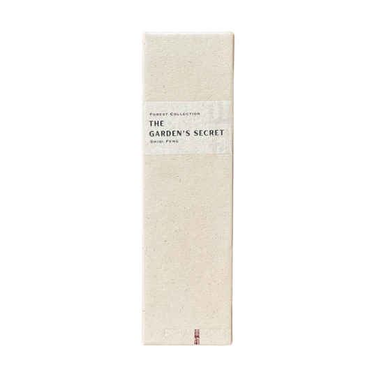 Sustainable The Garden‘s Secret Incense box in champagne hue - recycled paper wrap with debossed Kaiwu emblem & artisan Shiqi name on handmade yellow textured label, embodying mindful luxury.